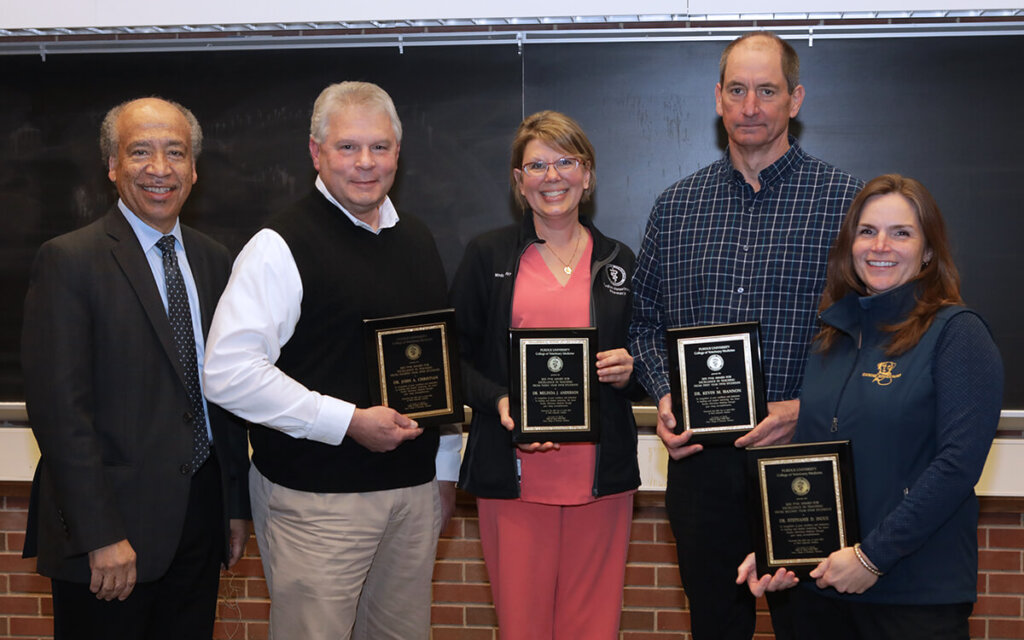 The group pause for a photo following the award ceremony.
